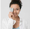Person holding a smartphone with a clear screen