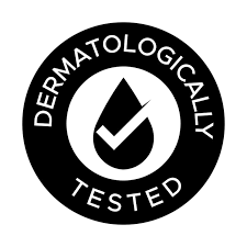 Dermatologically tested logo with a black circle and white text and symbol.