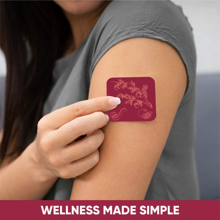 Woman applying a wellness GLP-1 patch to upper arm, promoting simple health solutions. Text: Wellness Made Simple.